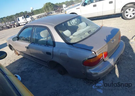 2002 Chevrolet Prizm Lsi из США, поврежденный, VIN 1Y1SK52822Z418377